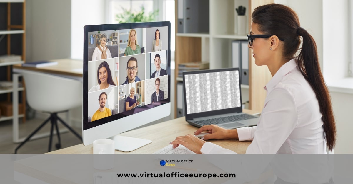 Woman talking with multiple people on a PC in a virtual environment